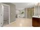 Bathroom featuring a walk-in closet, soaking tub, and glass enclosed shower with tile surround at 5761 E Emerald Oaks Ln, Acworth, GA 30102