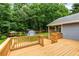 Multi-level wooden deck overlooking a beautiful, private backyard with mature trees at 5761 E Emerald Oaks Ln, Acworth, GA 30102