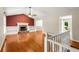 Spacious living room with hardwood floors, fireplace and views of the backyard at 5761 E Emerald Oaks Ln, Acworth, GA 30102