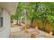 Inviting backyard with a brick fire pit and wooden Adirondack chairs, perfect for relaxing at 80 Vinson Se Dr, Atlanta, GA 30317