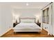 Cozy bedroom with hardwood floors, neutral color palette, and ample natural light at 80 Vinson Se Dr, Atlanta, GA 30317