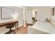 Bedroom with desk and daybed and ensuite bathroom and hardwood floors at 80 Vinson Se Dr, Atlanta, GA 30317