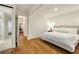 Bright bedroom with hardwood floors, neutral decor and ensuite bathroom at 80 Vinson Se Dr, Atlanta, GA 30317