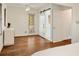Bright bedroom features hardwood floors, white walls, and access to outdoor space via glass door at 80 Vinson Se Dr, Atlanta, GA 30317
