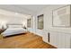 Bright bedroom with hardwood floors, neutral decor and art piece at 80 Vinson Se Dr, Atlanta, GA 30317