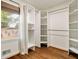 Bright closet with hardwood floors, shelving and natural light at 80 Vinson Se Dr, Atlanta, GA 30317