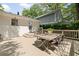 Outdoor wooden deck with a dining table and chairs, offering a great space for entertaining and relaxing at 80 Vinson Se Dr, Atlanta, GA 30317