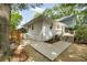 The house has a backyard deck and stone patio area for outdoor entertaining at 80 Vinson Se Dr, Atlanta, GA 30317