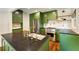 Stylish kitchen with green cabinetry, stainless steel appliances, and a large island at 80 Vinson Se Dr, Atlanta, GA 30317