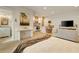 Open-concept living room features a TV, seating area, and a view into the kitchen, creating a warm and inviting space at 80 Vinson Se Dr, Atlanta, GA 30317