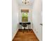 Cozy office with natural light, chandelier, and desk with chair on hardwood floors at 80 Vinson Se Dr, Atlanta, GA 30317