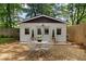 Charming outdoor shed with a seating area, creating a cozy and inviting space for relaxation and enjoyment at 80 Vinson Se Dr, Atlanta, GA 30317
