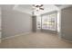 Spacious bedroom with tray ceiling and large windows offering plenty of natural light at 123 Mcgill Park Ave # 123, Atlanta, GA 30312