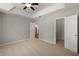 Comfortable bedroom featuring tray ceilings, plush carpet, and ample closet space at 123 Mcgill Park Ave # 123, Atlanta, GA 30312