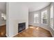 Cozy fireplace and hardwood floors complement this corner of the living room at 123 Mcgill Park Ave # 123, Atlanta, GA 30312