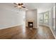 Spacious living room features hardwood flooring, fireplace, and lots of natural light at 123 Mcgill Park Ave # 123, Atlanta, GA 30312