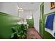 Bathroom with vintage-style decor, green wainscoting and classic fixtures at 302 Chinquapin Sw Dr, Marietta, GA 30064