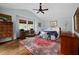 Serene main bedroom with vaulted ceilings, an area rug, and lots of natural light at 302 Chinquapin Sw Dr, Marietta, GA 30064