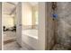 Bathroom featuring a soaking tub and walk-in shower at 474 Boxelder Rd, Atlanta, GA 30349