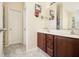 Bathroom with double sink vanity, tile flooring and natural light at 474 Boxelder Rd, Atlanta, GA 30349