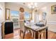 Bright dining area with natural light, hardwood floors, and a cozy atmosphere for meals at 474 Boxelder Rd, Atlanta, GA 30349