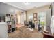 Cozy home office with large windows, a comfortable desk setup, and built-in shelving for storage at 474 Boxelder Rd, Atlanta, GA 30349