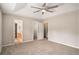 Bedroom with doors leading to a private bathroom and closet, enhancing convenience and privacy at 75 Plantation Ln, Locust Grove, GA 30248
