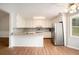 Well-equipped kitchen features modern appliances and granite countertops at 75 Plantation Ln, Locust Grove, GA 30248