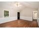 Cozy room features wood-look flooring, fresh paint and natural light at 75 Plantation Ln, Locust Grove, GA 30248