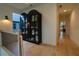 Upstairs hallway features a black display case and views of the outdoors at 1122 Rice Nw St, Atlanta, GA 30318
