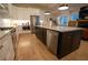 Modern kitchen with stainless steel appliances, a center island, and a sleek design at 1122 Rice Nw St, Atlanta, GA 30318