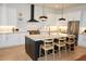 A well-designed kitchen includes an island with seating, stylish fixtures, and ample counter space at 1122 Rice Nw St, Atlanta, GA 30318