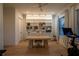 Bright and airy home office with custom built-in shelving and ample natural light from large windows at 1122 Rice Nw St, Atlanta, GA 30318