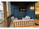 Cozy screened-in porch with comfortable seating and outdoor lighting at 1122 Rice Nw St, Atlanta, GA 30318