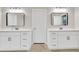 Bathroom featuring double sinks with white cabinets at 1547 Trilogy Park, Hoschton, GA 30548