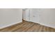 Bedroom with hardwood floors and closet at 1547 Trilogy Park, Hoschton, GA 30548