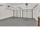 Spacious two car garage with automatic door openers and neutral gray epoxy floors at 1547 Trilogy Park, Hoschton, GA 30548