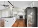 Spacious kitchen featuring hardwood floors, granite countertops, stainless steel appliances, and ample cabinet space at 2178 Shamrock Dr, Decatur, GA 30032
