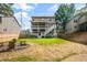 A spacious backyard features a charming fire pit area, perfect for outdoor gatherings and relaxation at 2573 Paul Nw Ave, Atlanta, GA 30318