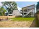 A spacious backyard features a charming fire pit area, perfect for outdoor gatherings and relaxation at 2573 Paul Nw Ave, Atlanta, GA 30318