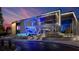 Topgolf building exterior with neon lights and entrance at 2573 Paul Nw Ave, Atlanta, GA 30318