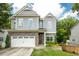 Beautiful two-story home featuring stone accents and a well-manicured lawn at 2573 Paul Nw Ave, Atlanta, GA 30318