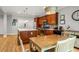Spacious kitchen with stainless appliances, large island, wooden cabinets and an adjoining dining area at 2573 Paul Nw Ave, Atlanta, GA 30318