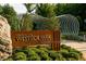 An entrance to Westside Park Atlanta, featuring signage, lush landscaping, and unique architectural elements at 2573 Paul Nw Ave, Atlanta, GA 30318