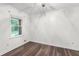 Cozy bedroom with hardwood floors, natural lighting, and neutral tones at 2644 Hickory Valley Dr, Snellville, GA 30078
