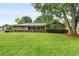 Inviting exterior view of home with a well-maintained lawn and classic brick facade at 2644 Hickory Valley Dr, Snellville, GA 30078