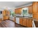 Classic kitchen with oak cabinets, modern appliances, and plenty of natural light at 2644 Hickory Valley Dr, Snellville, GA 30078
