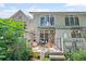 Landscaped backyard featuring a charming patio, mature trees, and serene outdoor ambiance at 1308 Fernwood Ne Cir, Atlanta, GA 30319