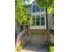 Contemporary townhome with brick accents, multiple windows, and a one-car garage beneath a welcoming entrance at 1308 Fernwood Ne Cir, Atlanta, GA 30319