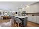 This kitchen has modern appliances, a marble island, and hardwood floors that add style and practicality to the space at 1308 Fernwood Ne Cir, Atlanta, GA 30319